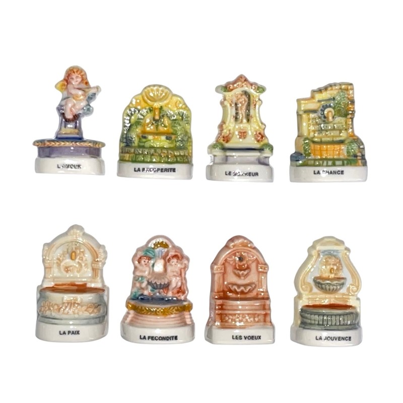 Série complète de 8 fèves L'oracle des fontaines 2002