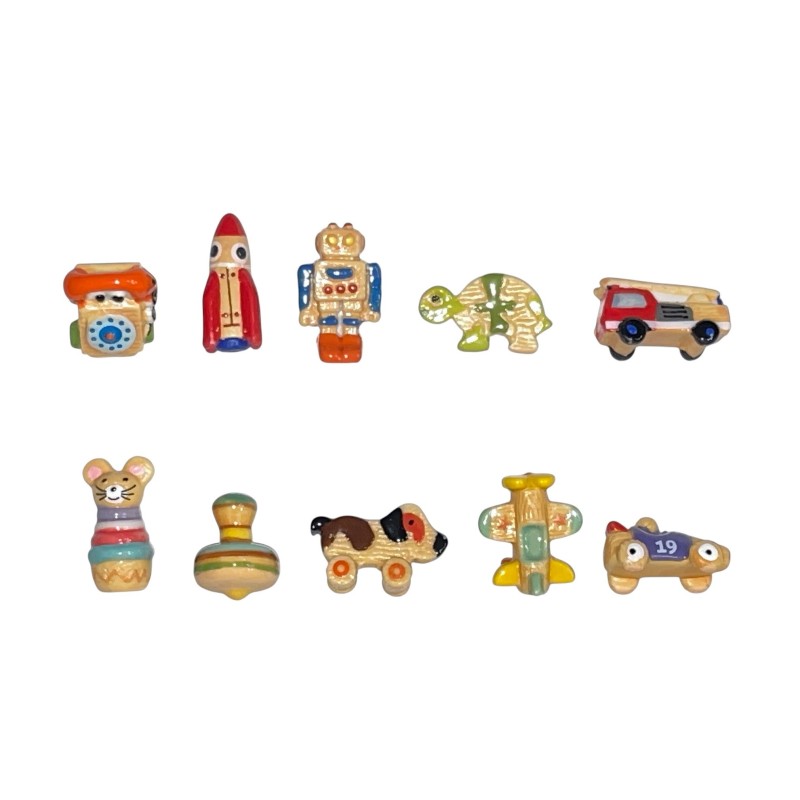 Série complète de 10 fèves Dans mon coffre à jouets 2026