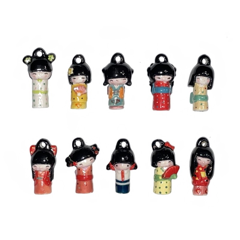 Série complète de 10 fèves Kokeshi 2014